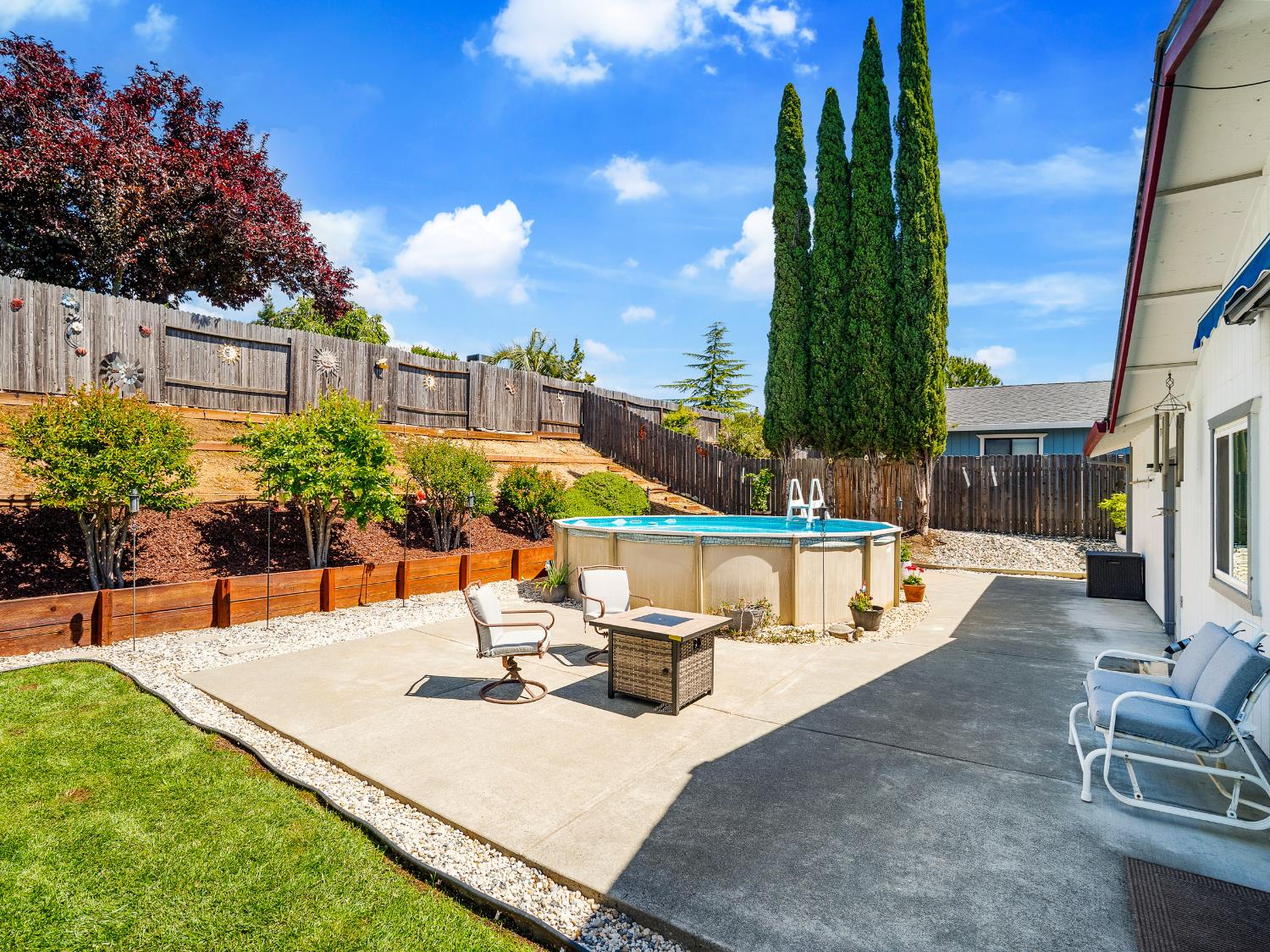 4914 Summit View Court El Dorado, CA 95623 - Photo 24 of 31 a view of a patio with swimming pool