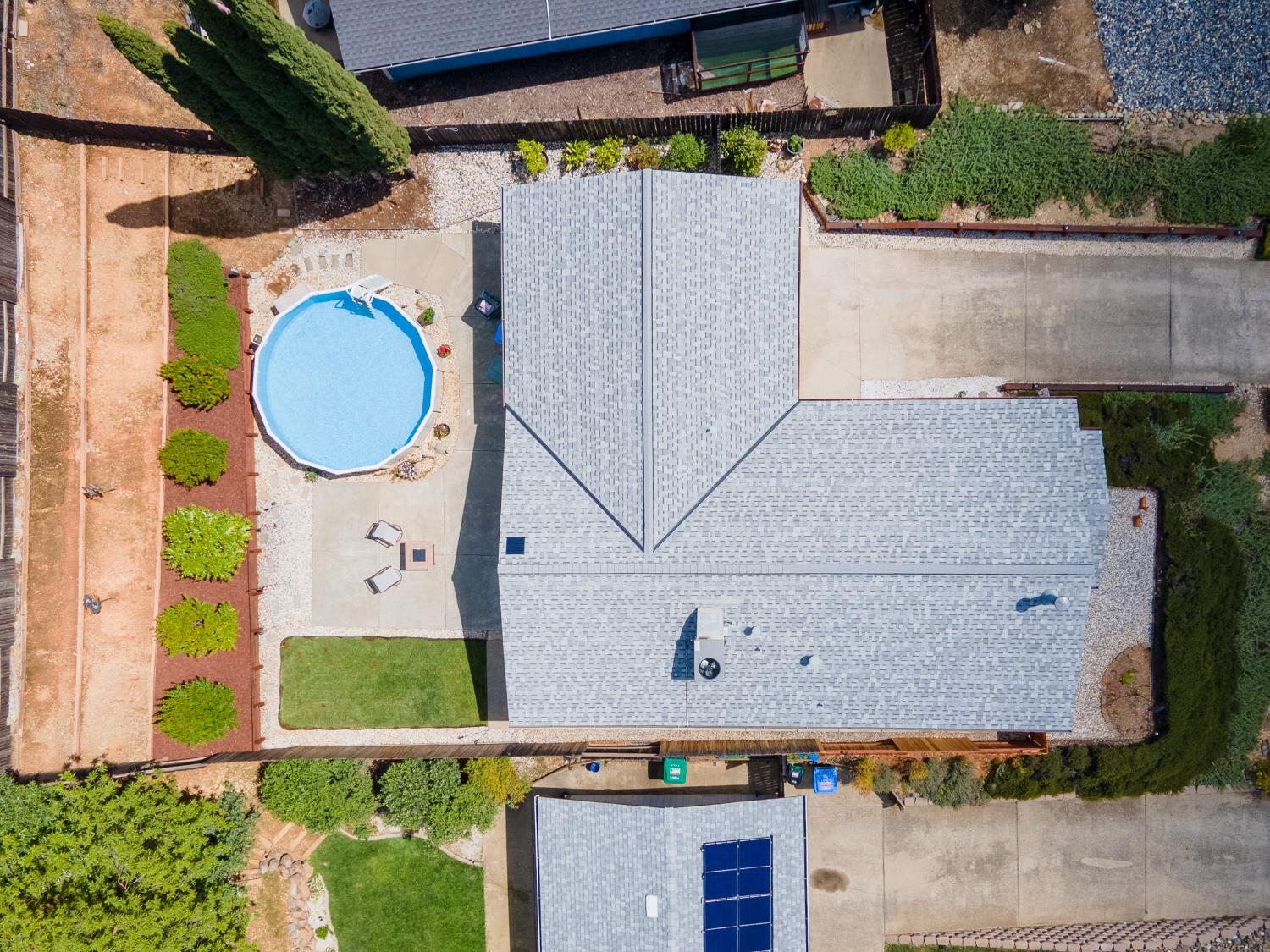 4914 Summit View Court El Dorado, CA 95623 - Photo 30 of 31 an aerial view of a house with a swimming pool