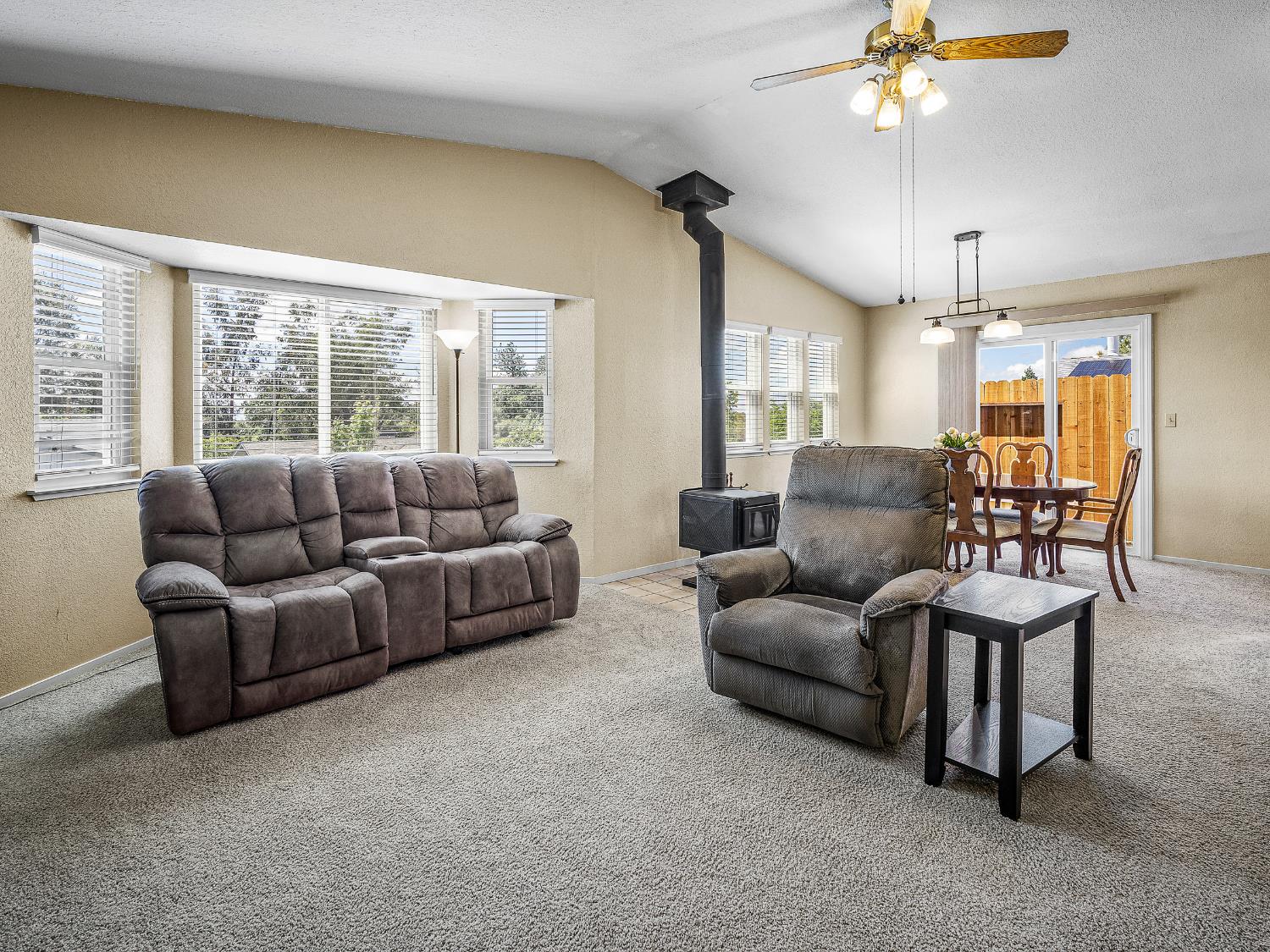 4914 Summit View Court El Dorado, CA 95623 - Photo 4 of 31 a living room with furniture and a chandelier