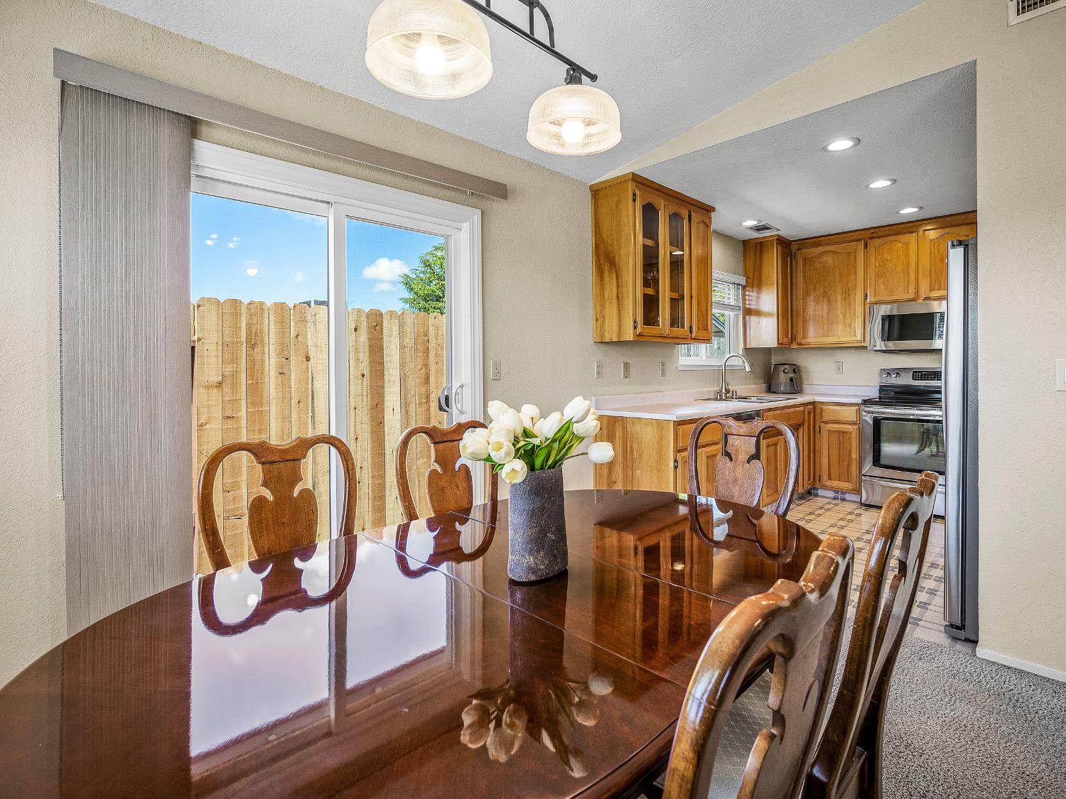 4914 Summit View Court El Dorado, CA 95623 - Photo 9 of 31 a view of a dining room with furniture window and wooden floor