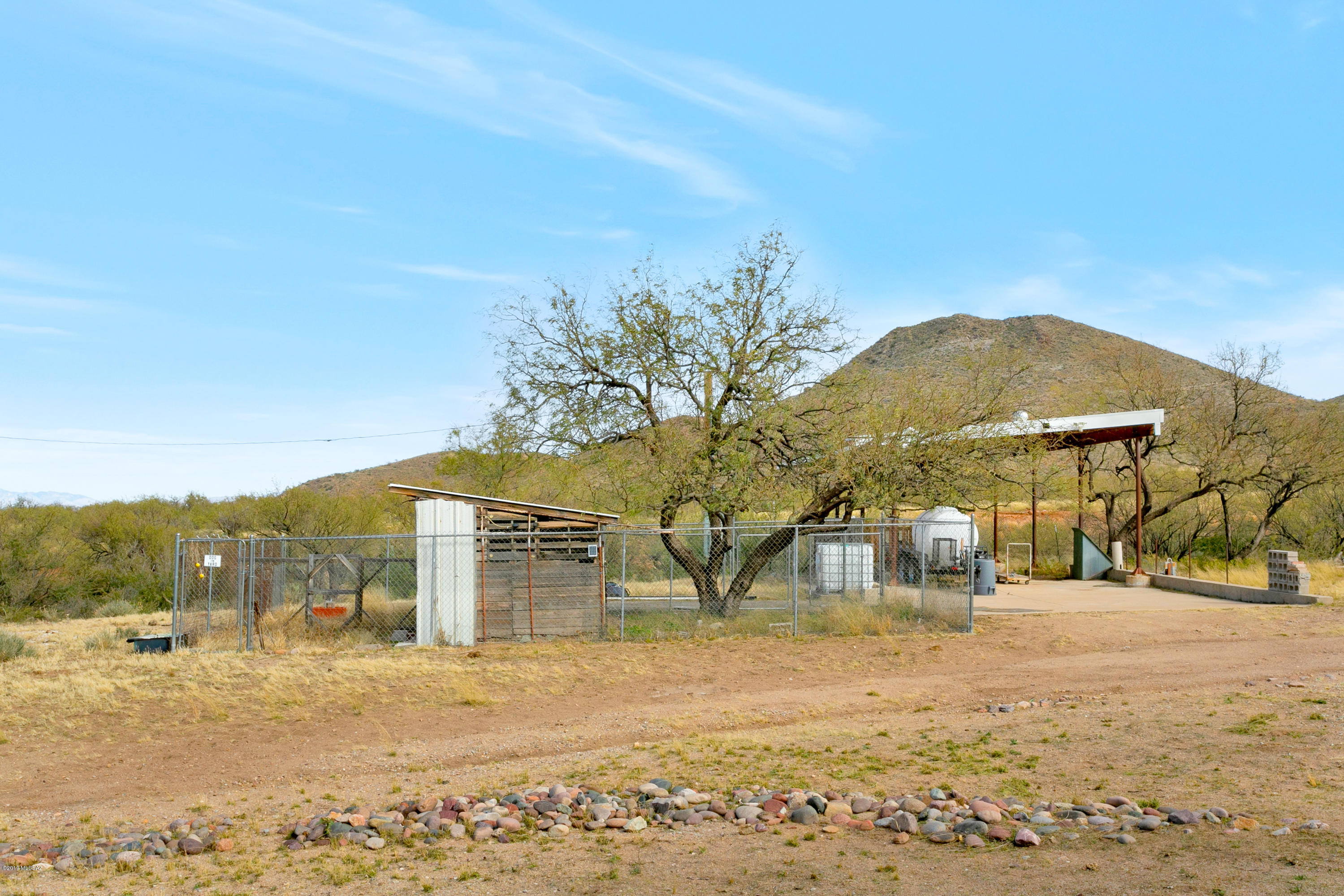 21960 South Helvetia Road Sahuarita, AZ 85629 - Photo 24 of 29 a view of a house with a yard