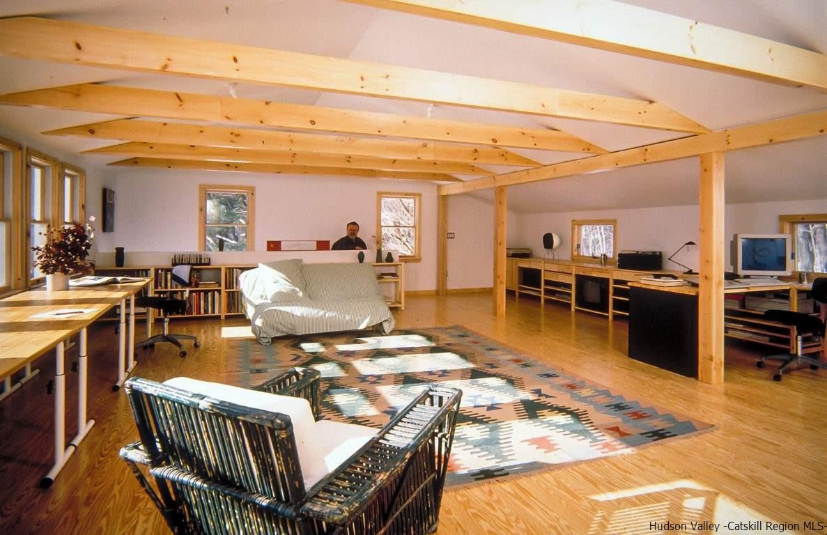 174 Peak Road Stone Ridge, NY 12484 - Photo 21 of 29 a living room with lots of furniture and kitchen view