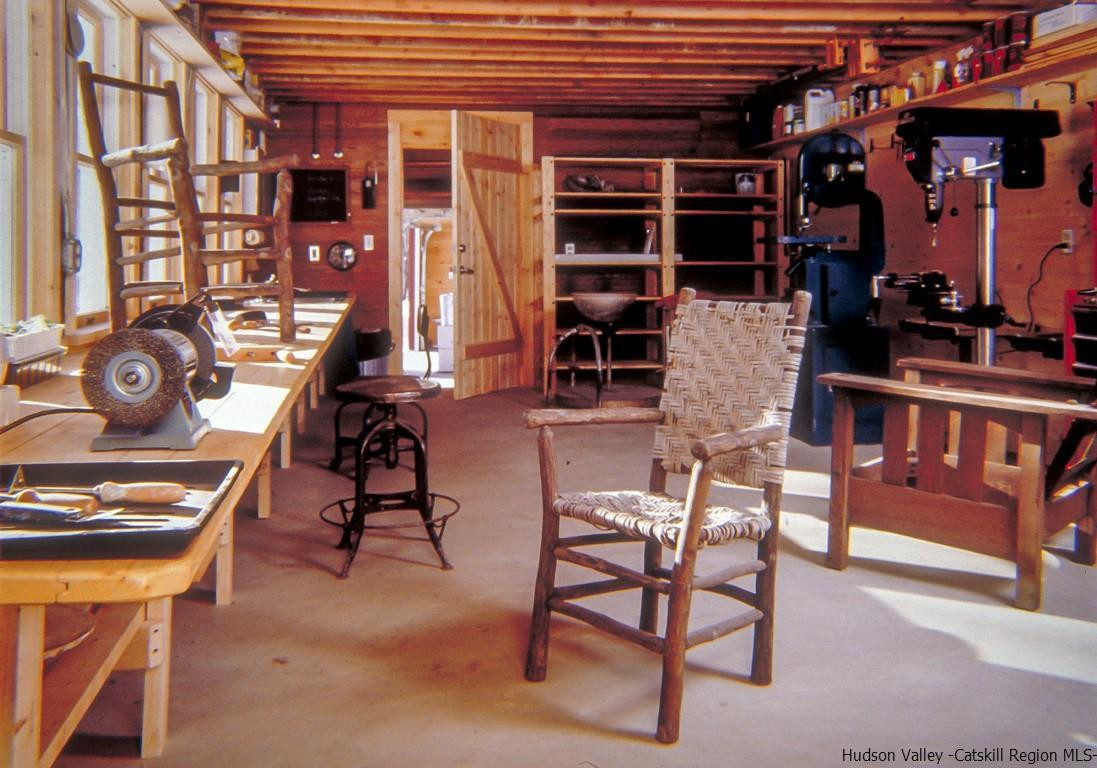 174 Peak Road Stone Ridge, NY 12484 - Photo 22 of 29 a view of a chairs and table in a patio