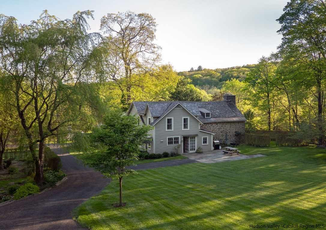 174 Peak Road Stone Ridge, NY 12484 - Photo 24 of 29 a view of a house with a big yard and large tree