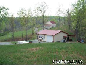 780 Meadow Crest Road Tryon, NC 28782 - Photo 6 of 12 a view of a house with a yard