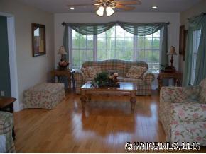 780 Meadow Crest Road Tryon, NC 28782 - Photo 7 of 12 a living room with couches and a coffee table