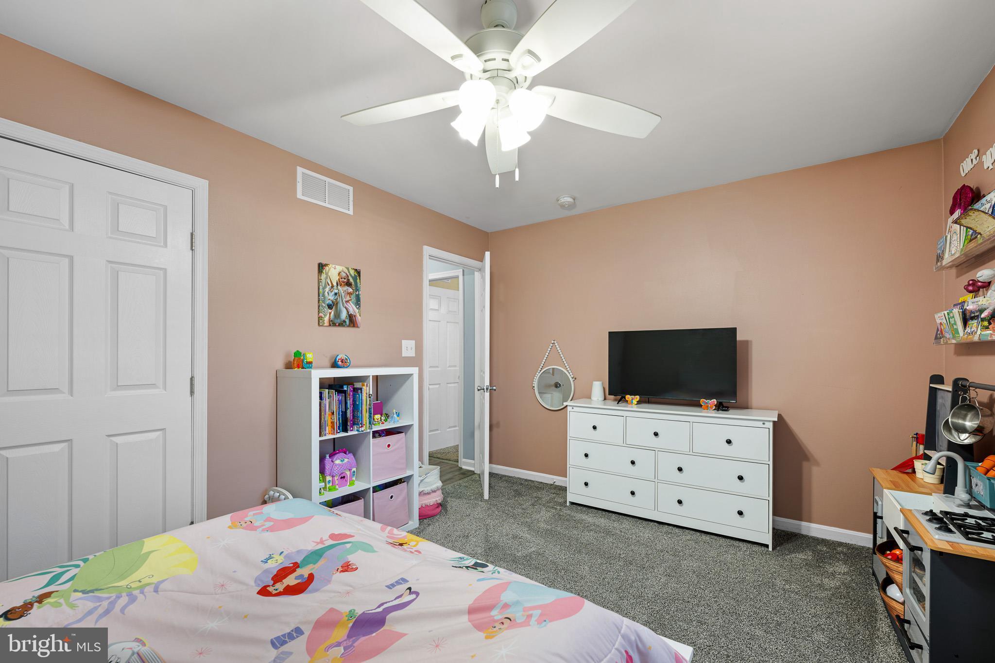 70 West Deer Trail Road Clayton, DE 19938 - Photo 21 of 25 a bedroom with a bed and furniture