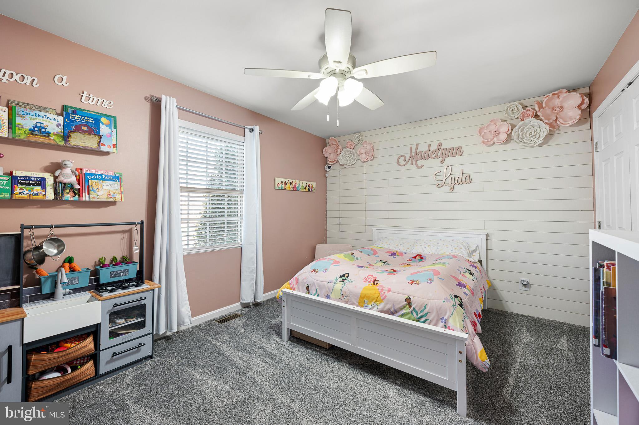 70 West Deer Trail Road Clayton, DE 19938 - Photo 23 of 25 a bedroom with a bed and cabinets