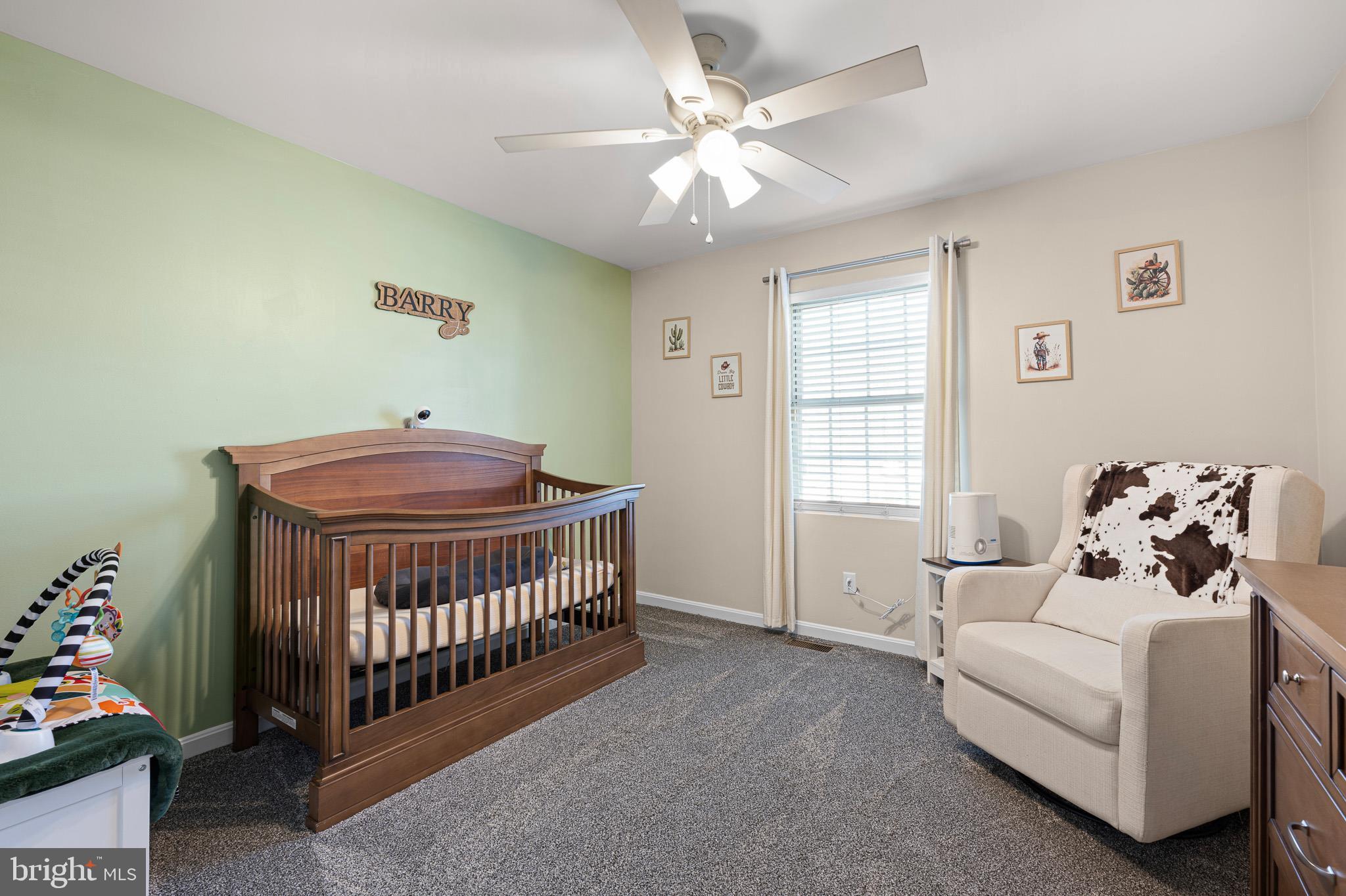 70 West Deer Trail Road Clayton, DE 19938 - Photo 25 of 25 a bedroom with furniture and a bed