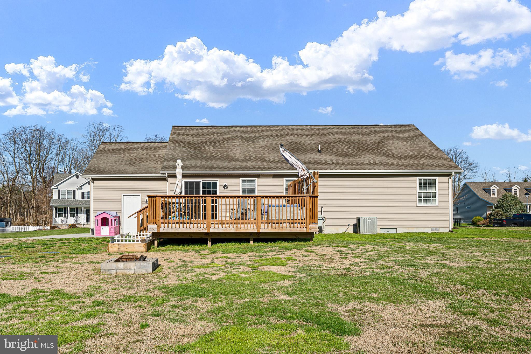 70 West Deer Trail Road Clayton, DE 19938 - Photo 4 of 25 a view of a house with a yard