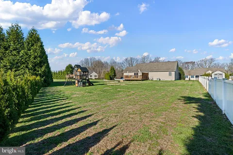 a view of a golf course with a garden
