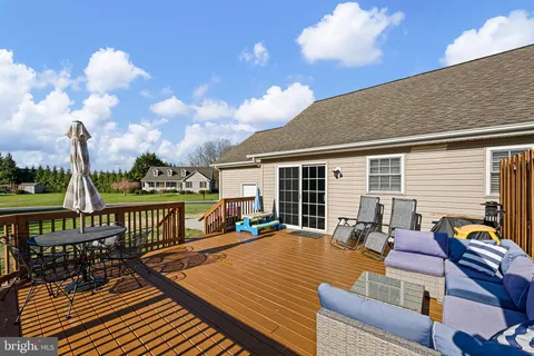 a view of a patio with swimming pool