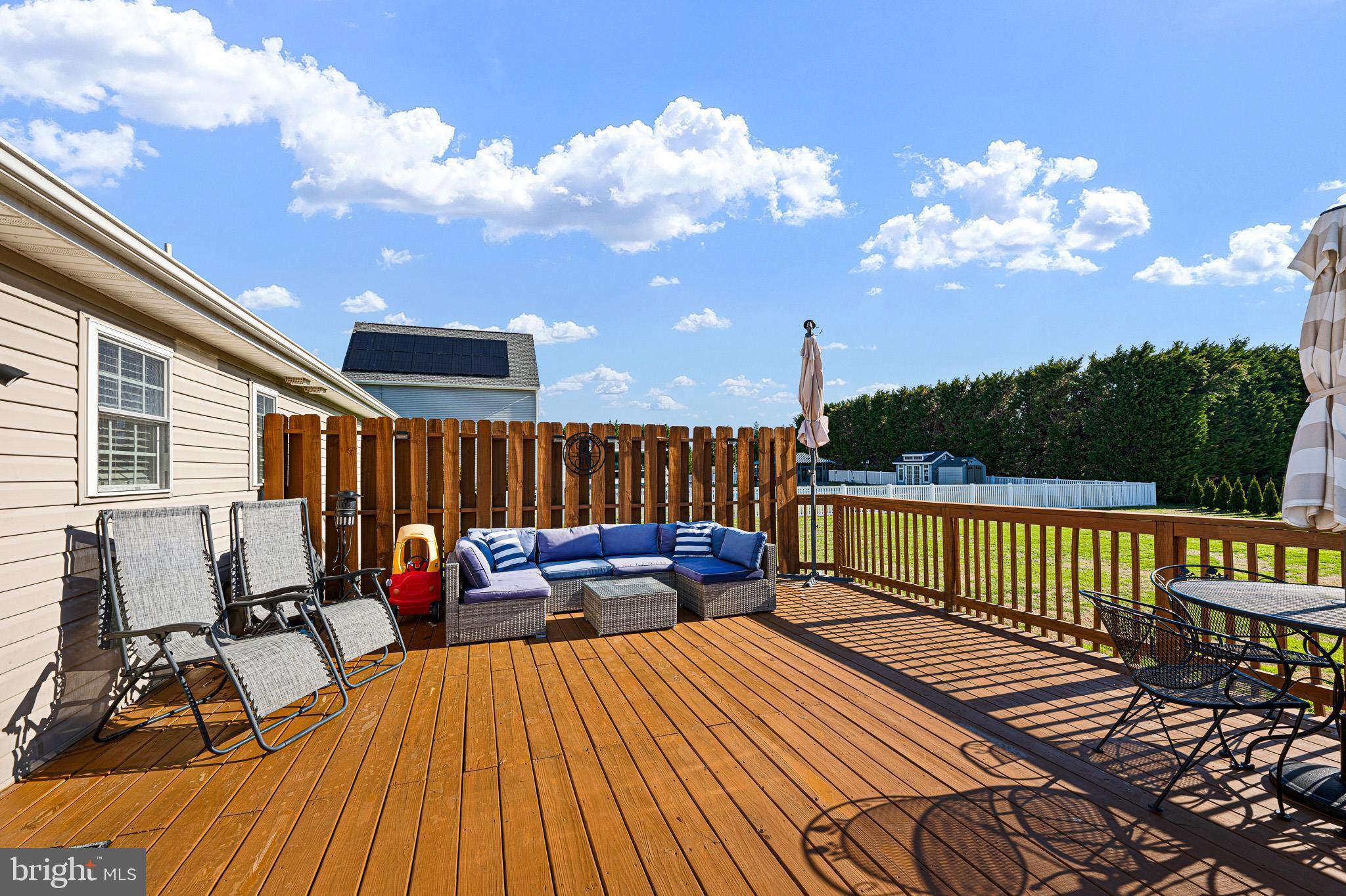 70 West Deer Trail Road Clayton, DE 19938 - Photo 7 of 25 a view of a roof deck with couches