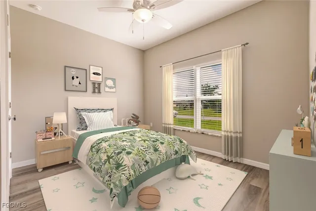 a bedroom with a bed and a table