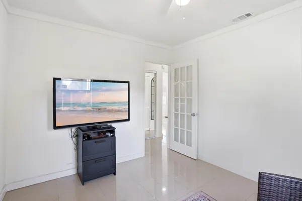 a room with furniture and wooden floor