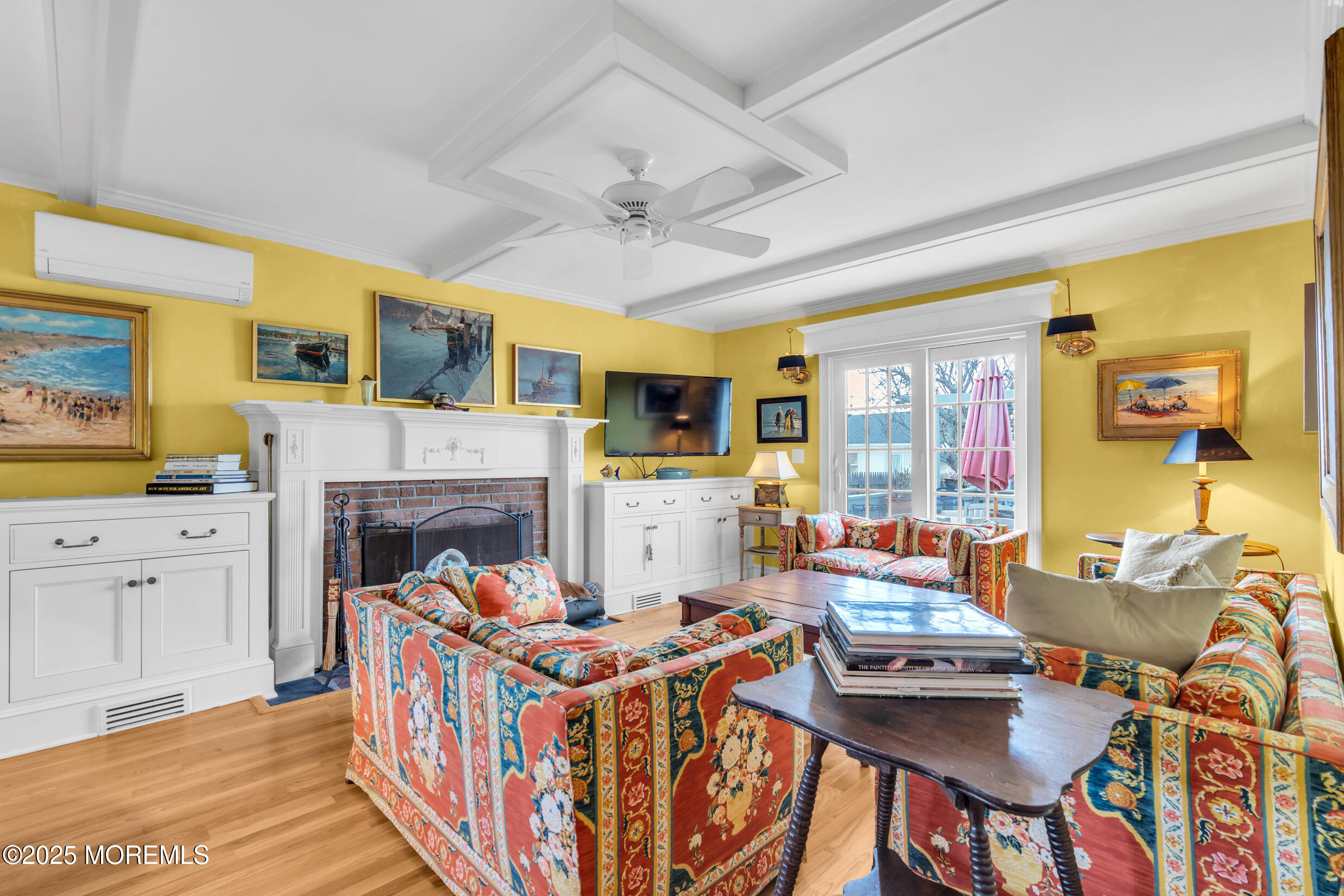 149 Highway 35 Mantoloking, NJ 08738 - Photo 13 of 29 a living room with furniture a fireplace and a flat screen tv