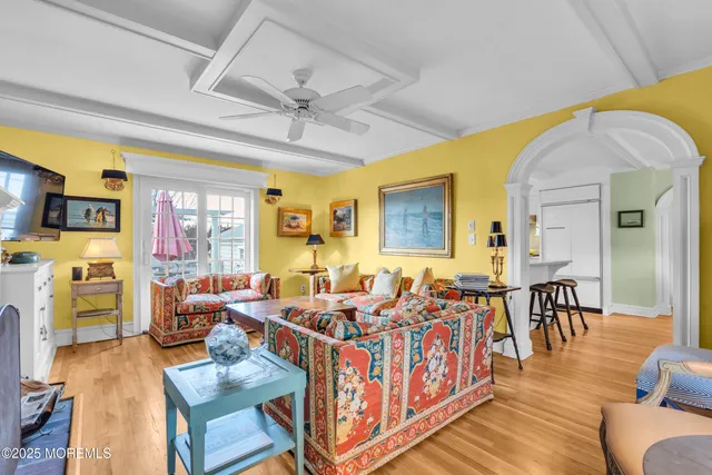 a large living room with furniture