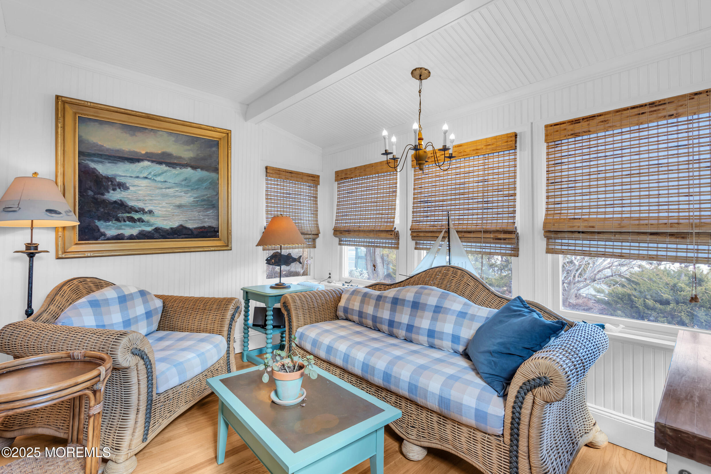149 Highway 35 Mantoloking, NJ 08738 - Photo 2 of 29 a living room with furniture a large window and a chandelier