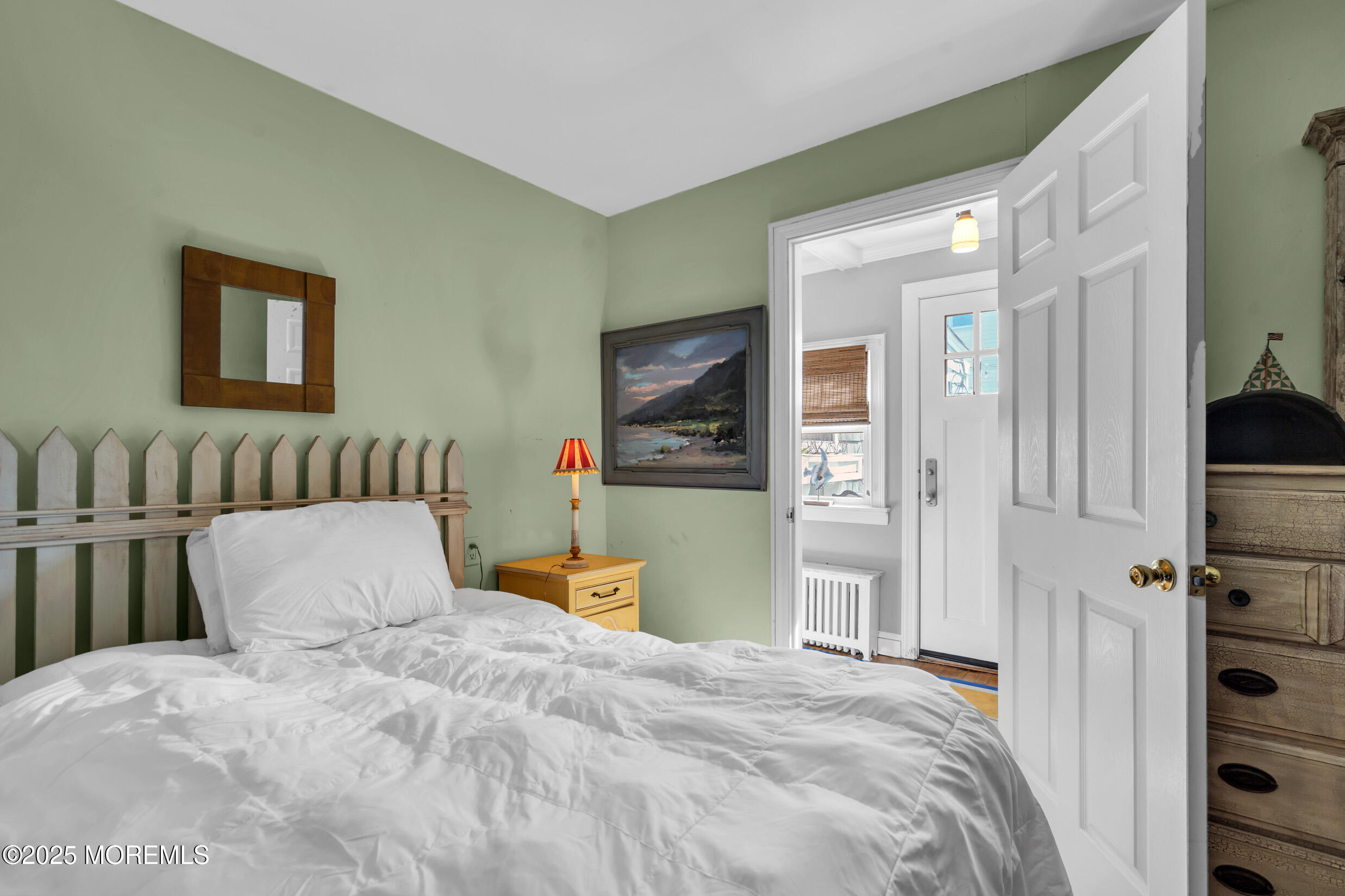 149 Highway 35 Mantoloking, NJ 08738 - Photo 21 of 29 a bedroom with a bed and a television