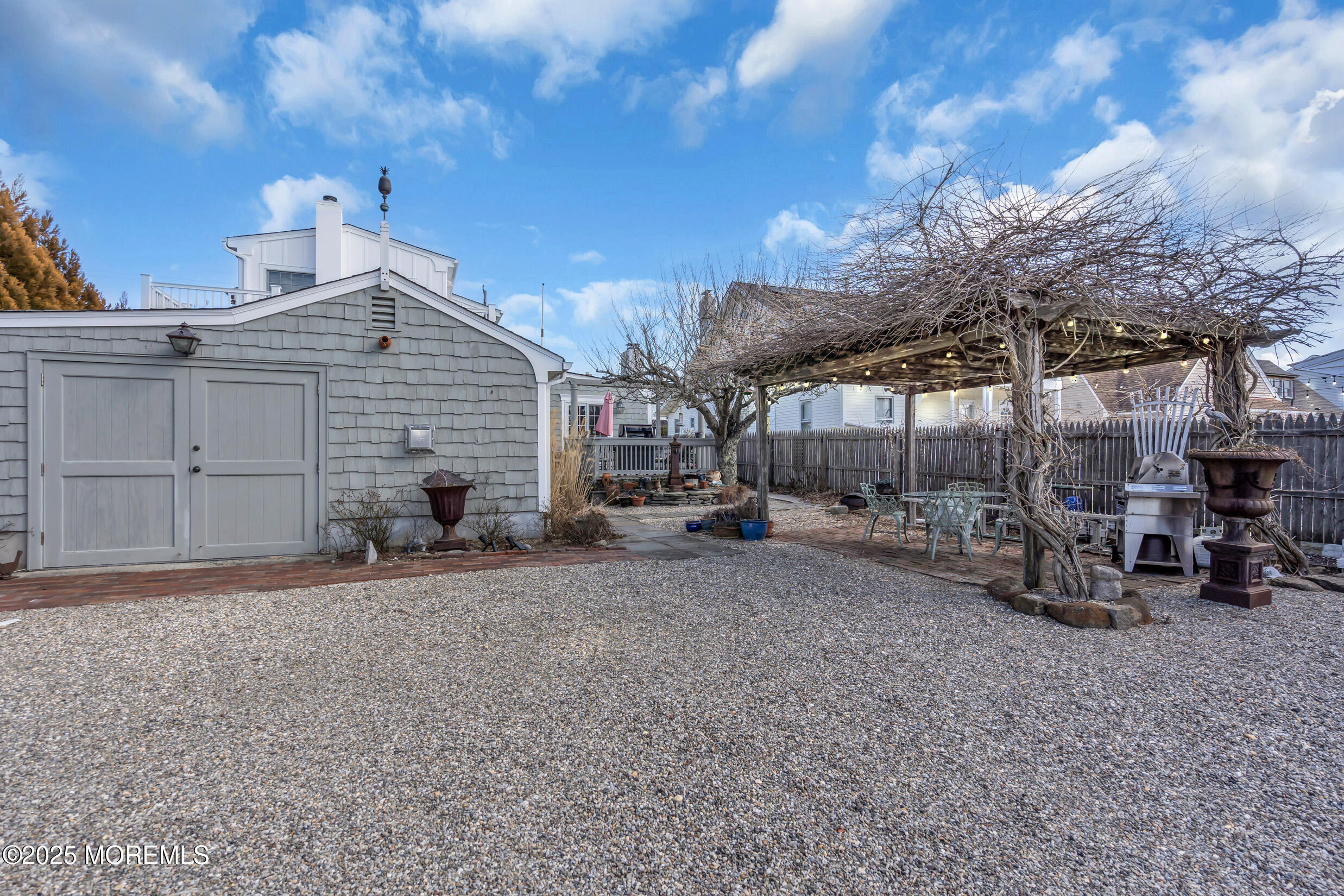 149 Highway 35 Mantoloking, NJ 08738 - Photo 23 of 29 a view of a house with backyard and sitting area