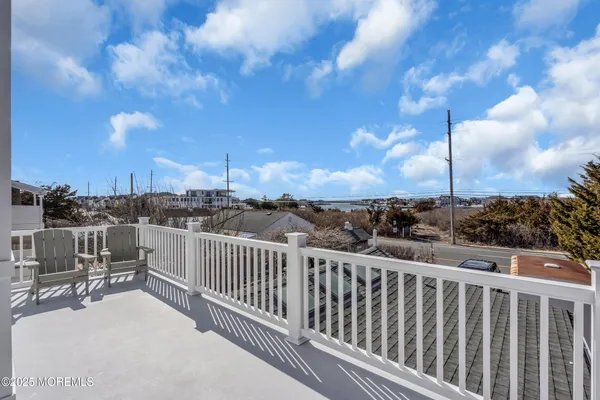 a view of a balcony with city view