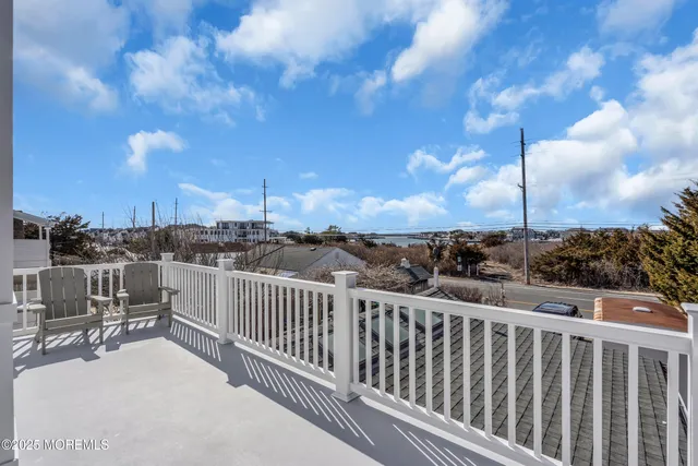 a view of a balcony with city view