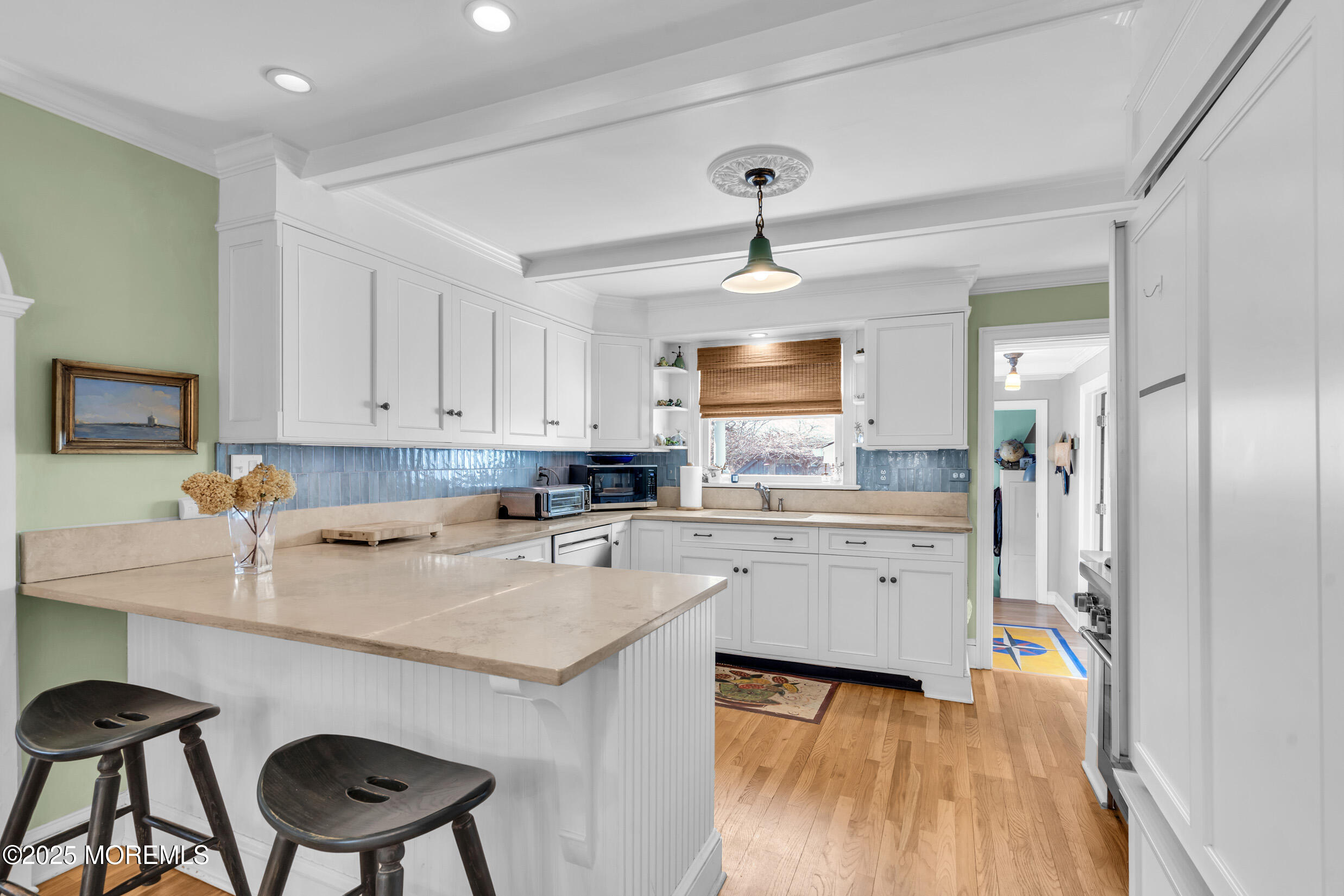 149 Highway 35 Mantoloking, NJ 08738 - Photo 8 of 29 a kitchen with a sink cabinets and wooden floor