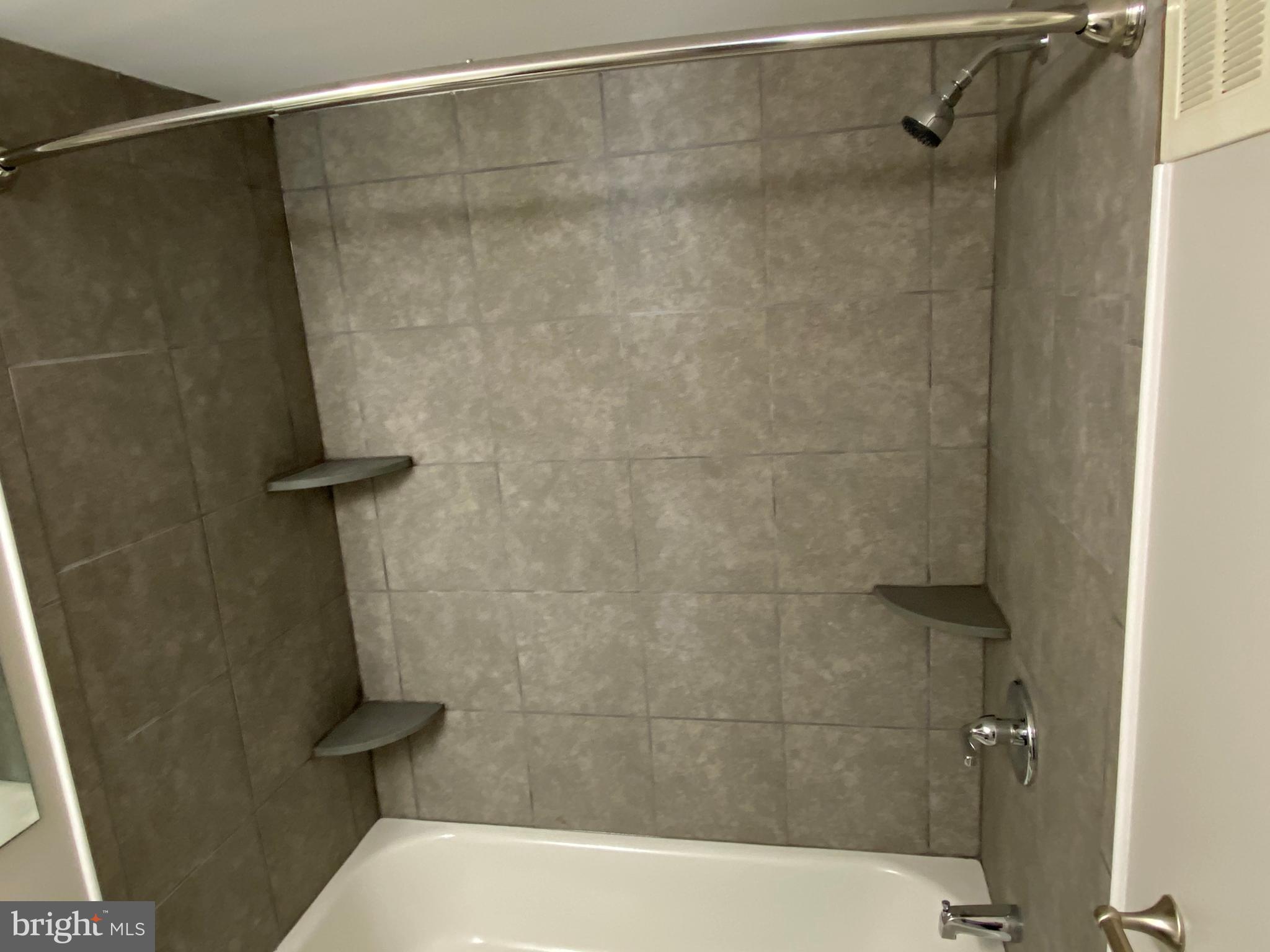 1155 York Rd., Unit G13 Warminster, PA 18974 - Photo 12 of 13 a bathroom with a shower and a shower
