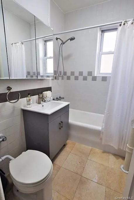 45-20 43rd Street, Unit 2C Queens, NY 11104 - Photo 4 of 14 a bathroom with a sink a toilet a mirror and shower