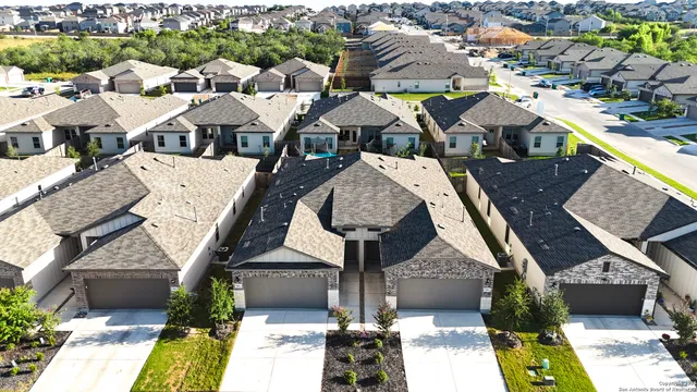 a view of a hallway with wooden shelves