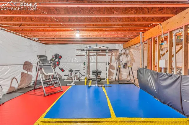 a view of a room with gym equipment