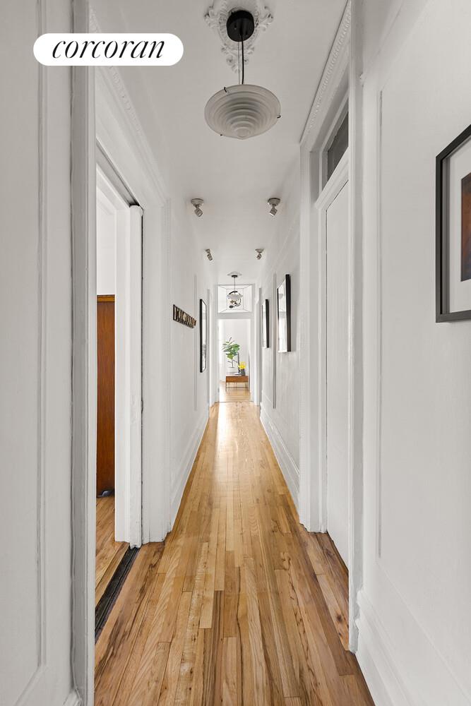 433 3rd Street, Unit 3 Brooklyn, NY 11215 - Photo 10 of 12 a view of a hallway with wooden floor and staircase
