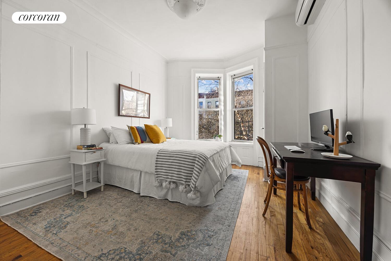 433 3rd Street, Unit 3 Brooklyn, NY 11215 - Photo 5 of 12 a bedroom with a bed and a table in it