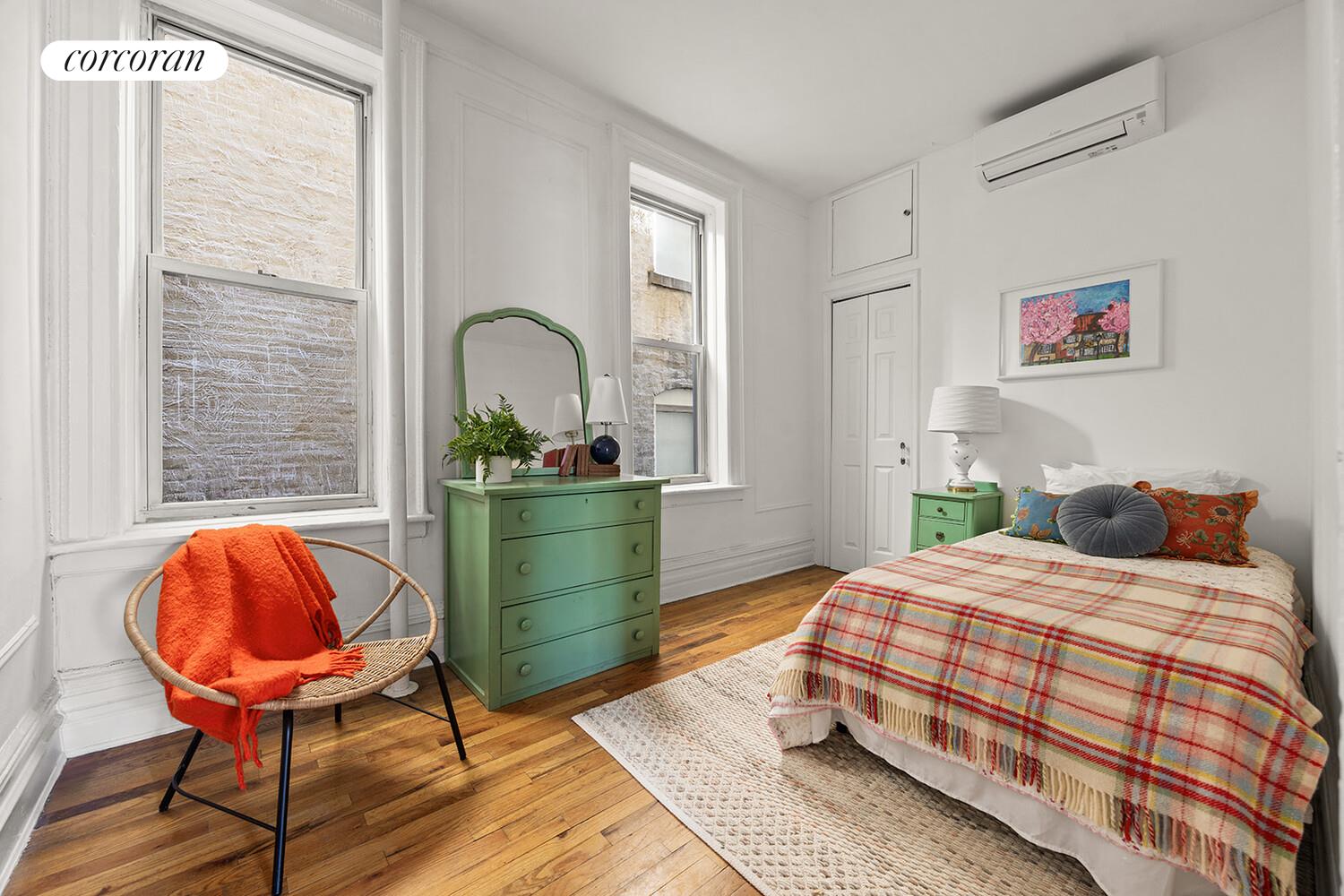 433 3rd Street, Unit 3 Brooklyn, NY 11215 - Photo 6 of 12 a bedroom with a bed and a potted plant