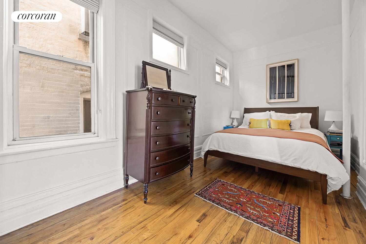 433 3rd Street, Unit 3 Brooklyn, NY 11215 - Photo 7 of 12 a bedroom with a bed and wooden floor