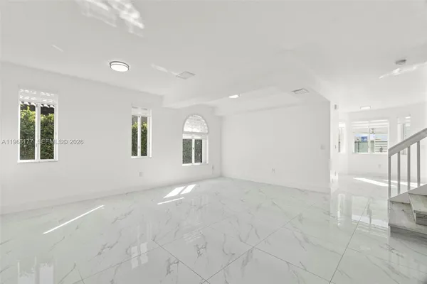 an empty room with windows