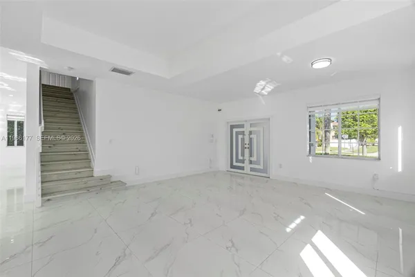 an empty room with windows