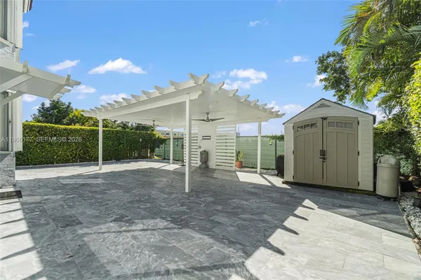 a view of a house with a yard and garage