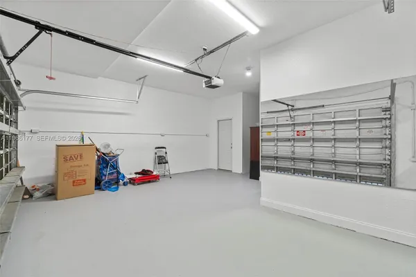 a view of storage and utility room with garage