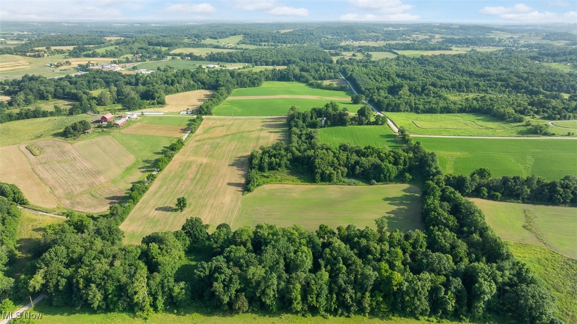 A Street Southwest Navarre, OH 44662 - Photo 33 of 36 Aerial view of property and surrounding area featuring rural landscape and large plots for crops