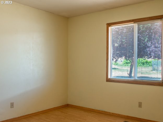 589 Lockwood Road Roseburg, OR 97471 - Photo 18 of 32 a view of empty room with wooden floor and fan