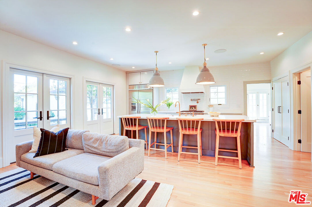 1944 Virginia Road Los Angeles, CA 90016 - Photo 14 of 36 a living room with furniture a window and wooden floor