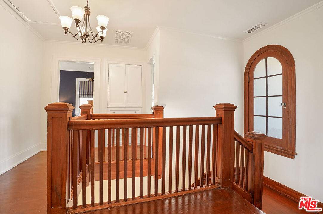1944 Virginia Road Los Angeles, CA 90016 - Photo 17 of 36 a view of entryway with wooden floor and a front door