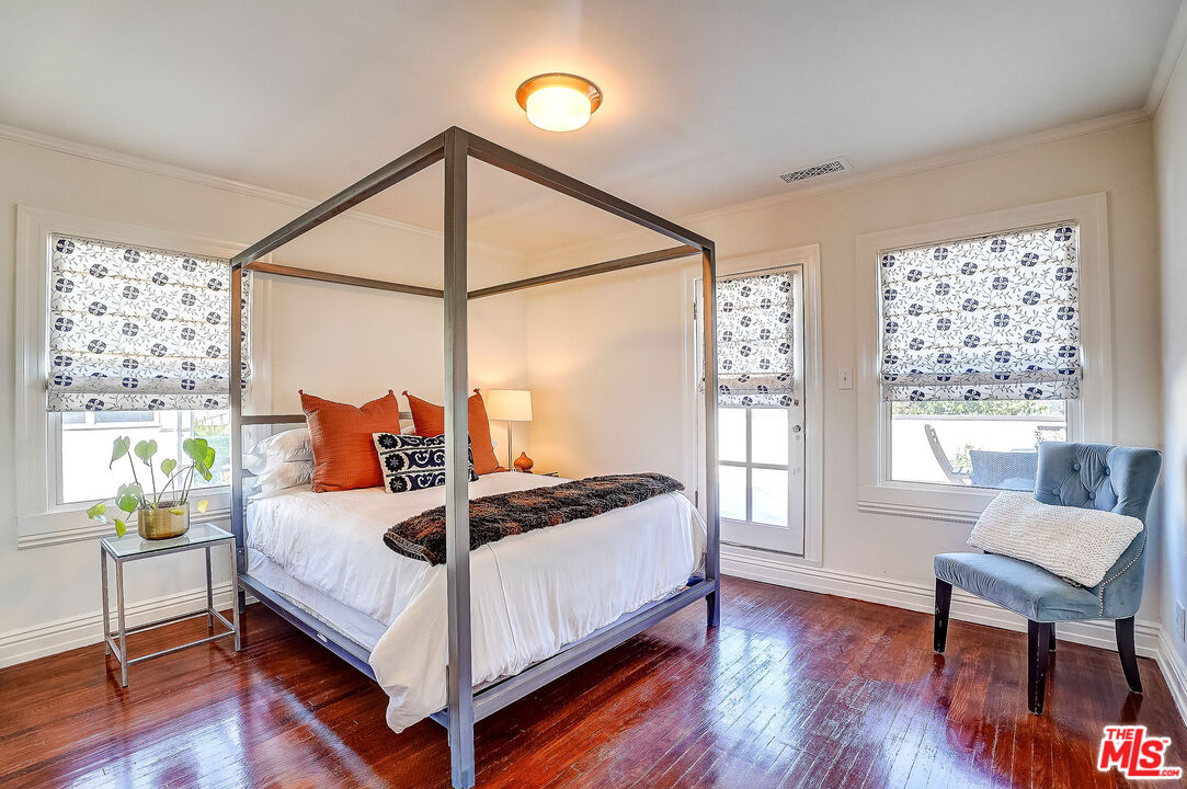 1944 Virginia Road Los Angeles, CA 90016 - Photo 20 of 36 a bedroom with a bed and a window