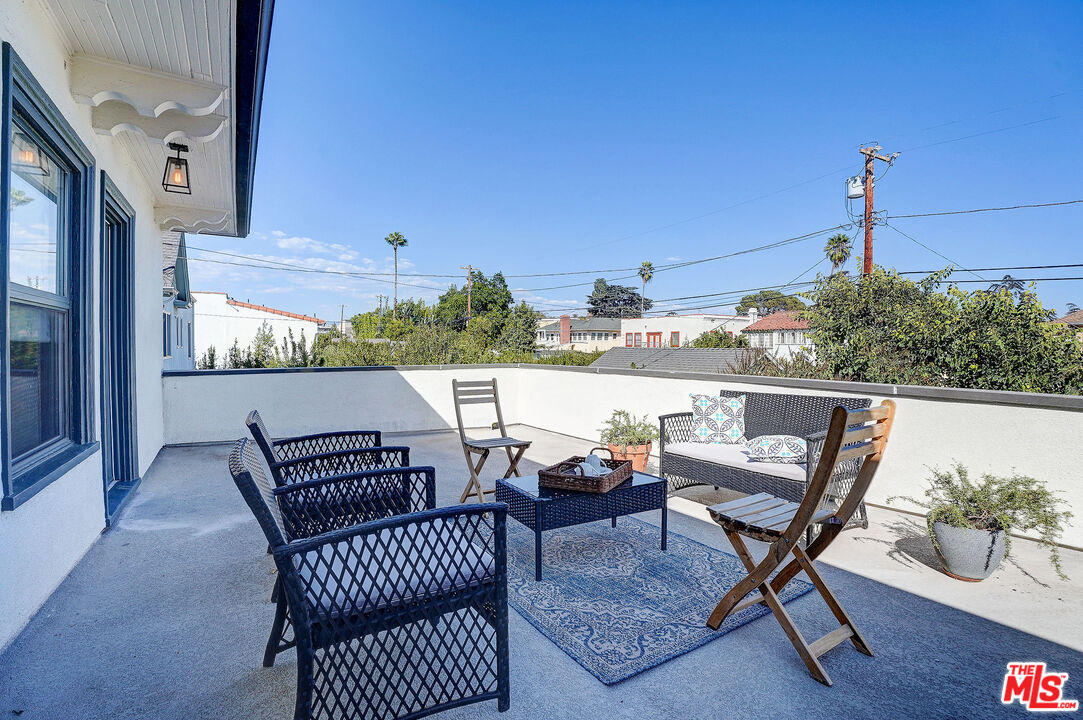 1944 Virginia Road Los Angeles, CA 90016 - Photo 21 of 36 a view of a chairs and table in the balcony