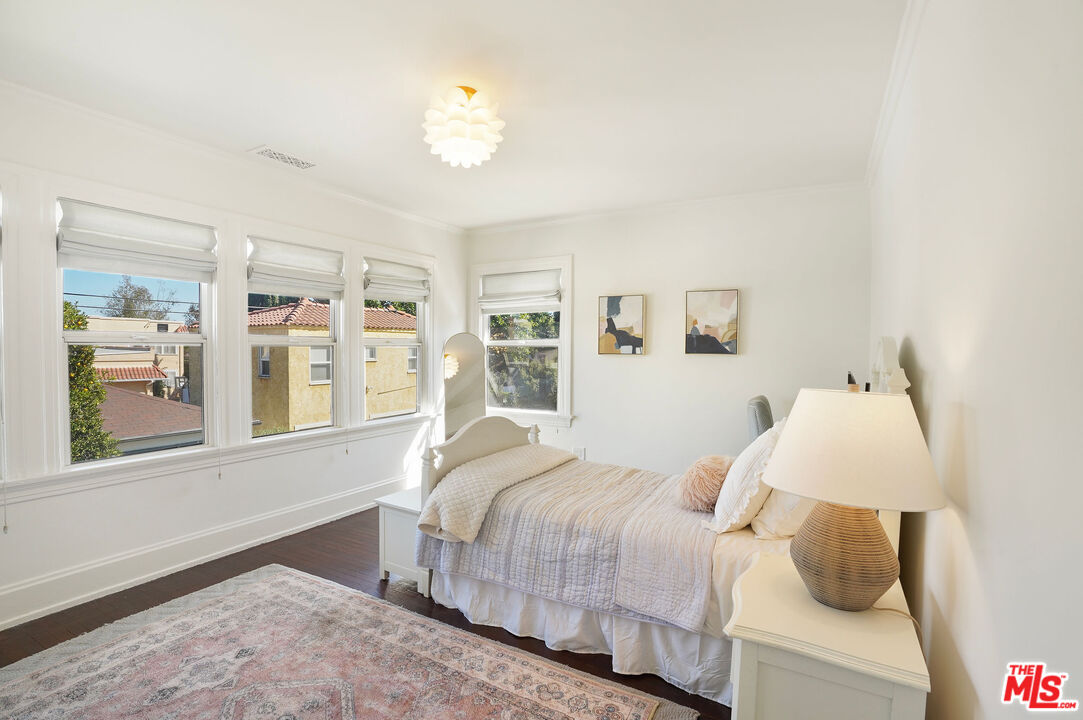 1944 Virginia Road Los Angeles, CA 90016 - Photo 25 of 36 a bedroom with a bed and a window