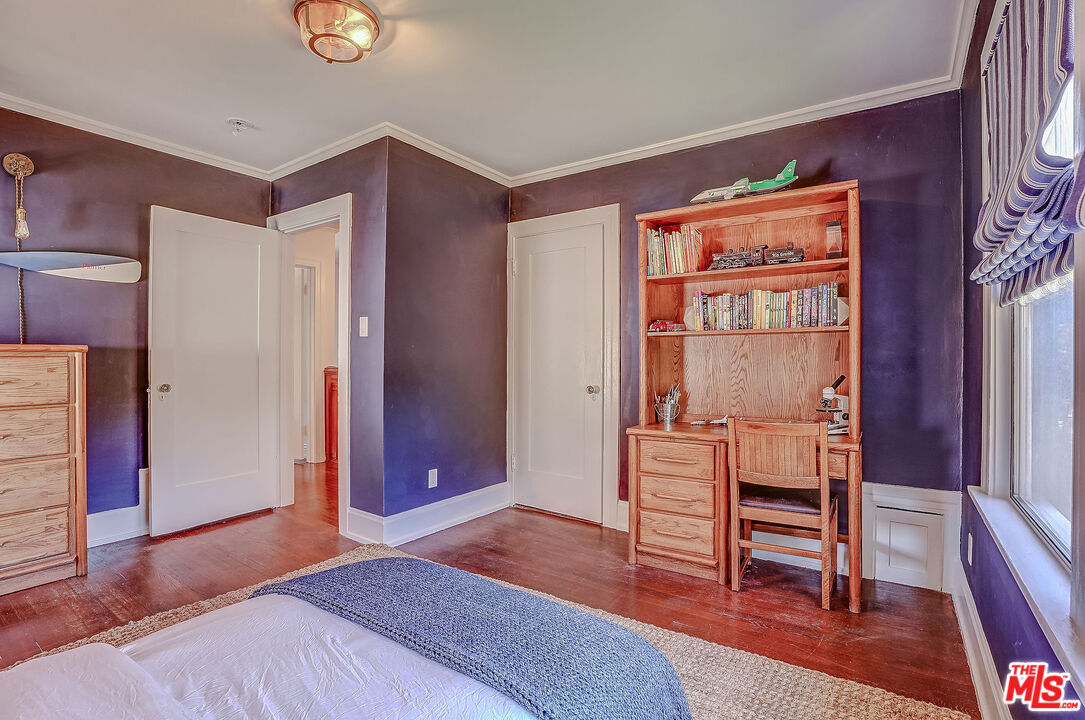1944 Virginia Road Los Angeles, CA 90016 - Photo 27 of 36 a bedroom with a bed and a dresser next to a window