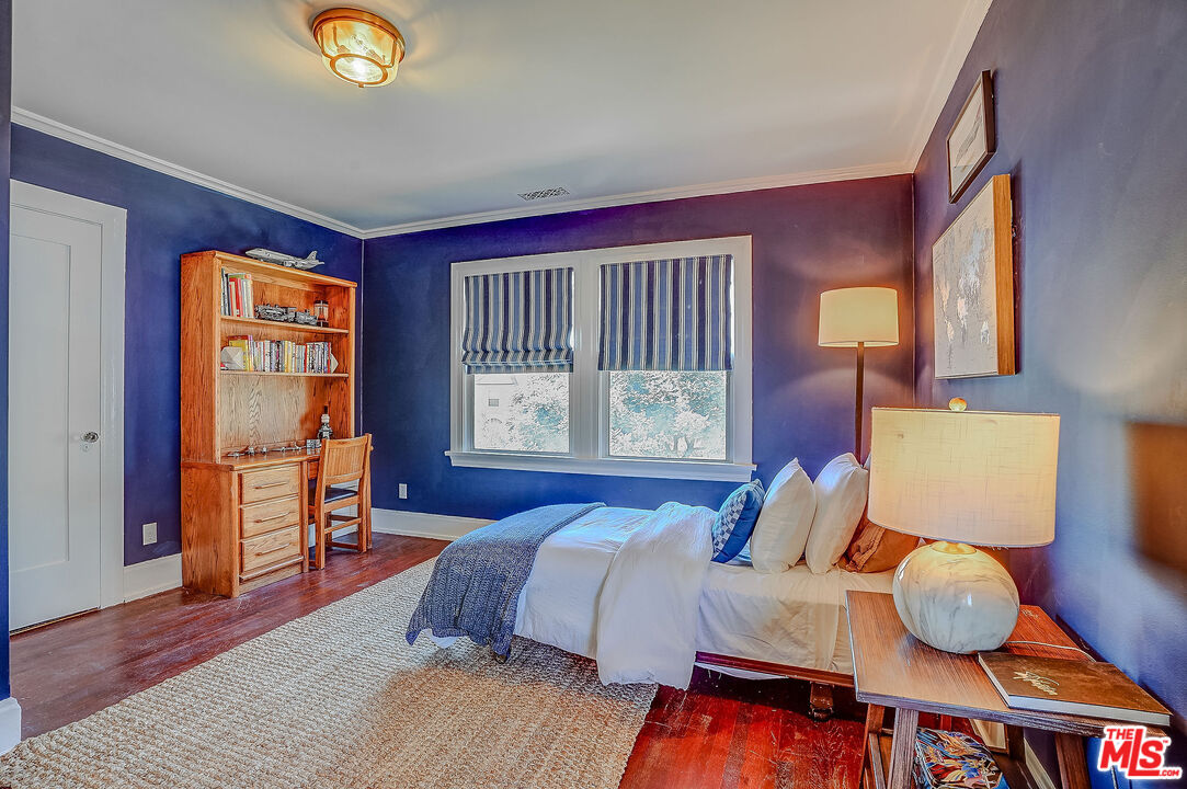 1944 Virginia Road Los Angeles, CA 90016 - Photo 28 of 36 a bed room with a bed and a window