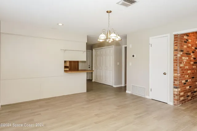 a view of a livingroom with a chandelier