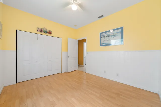 a bathroom with a sink a vanity and a mirror